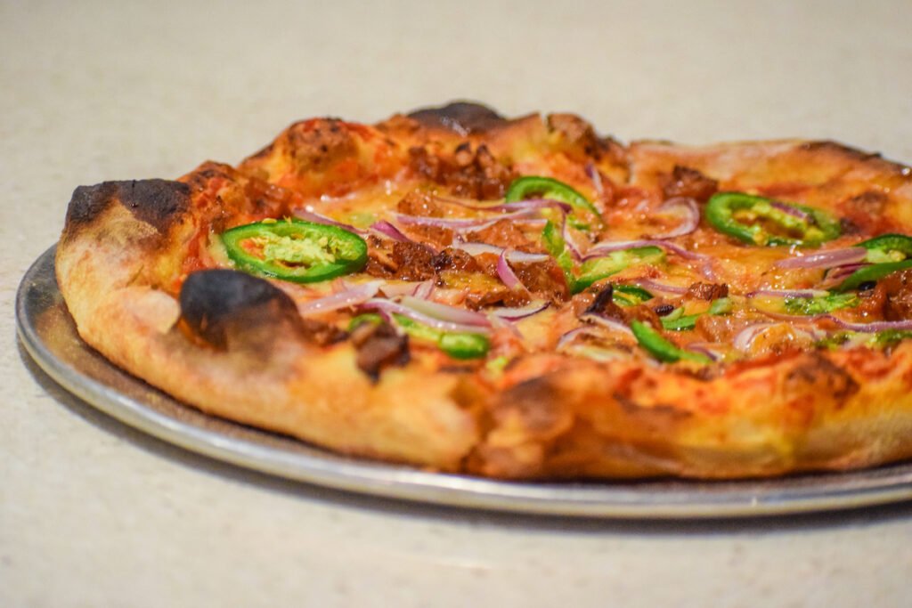 The bacon and jalapeño pizza from Seabirds Kitchen. Photo by Brian Addison.