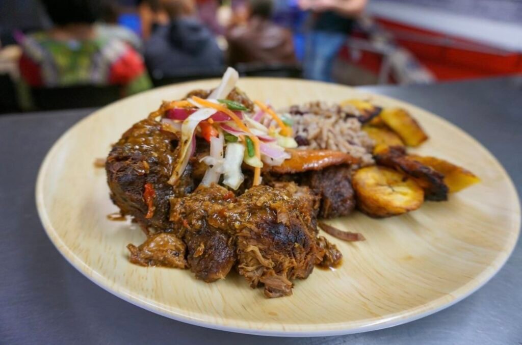 "Haitian carnitas" is one of a handful of fusion dishes offered at Cheri's Caribbean Cuisine. Photo by Brian Addison.