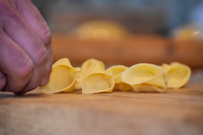 Chef Cameron Slaugh's hand-rolled, hand-formed sopressini are one of Nonna Mercato's most beautiful pastas. Photo by Brian Addison.