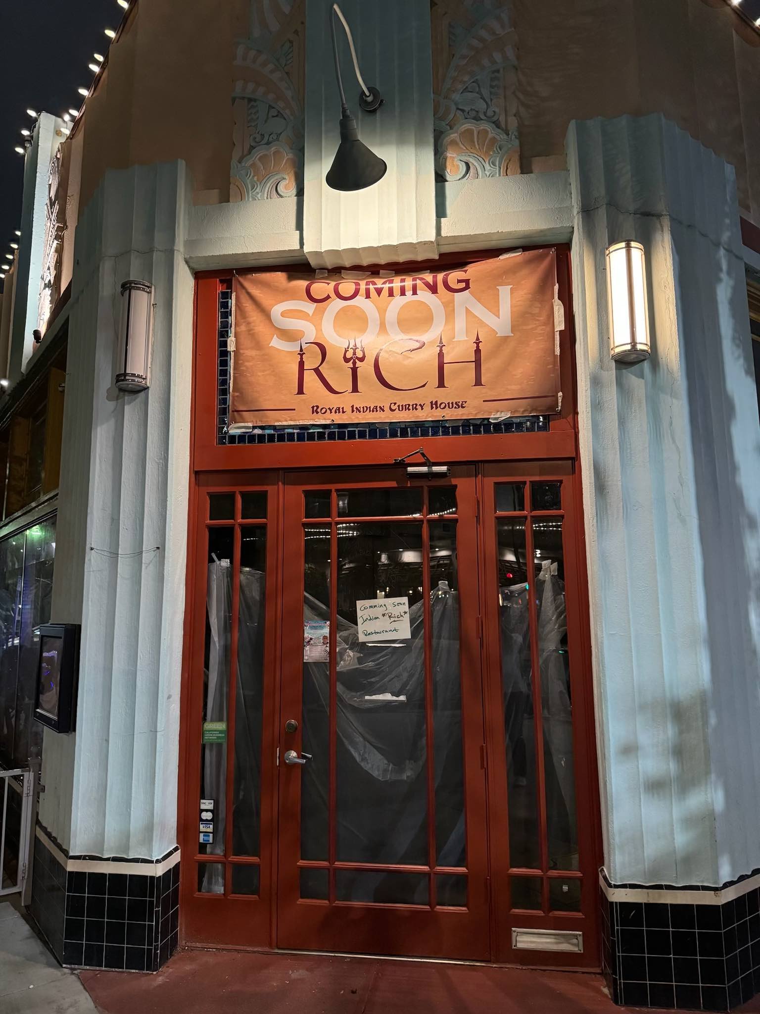 Temporary signage for RICH has gone up in the East Village. Photo by James Tir. 