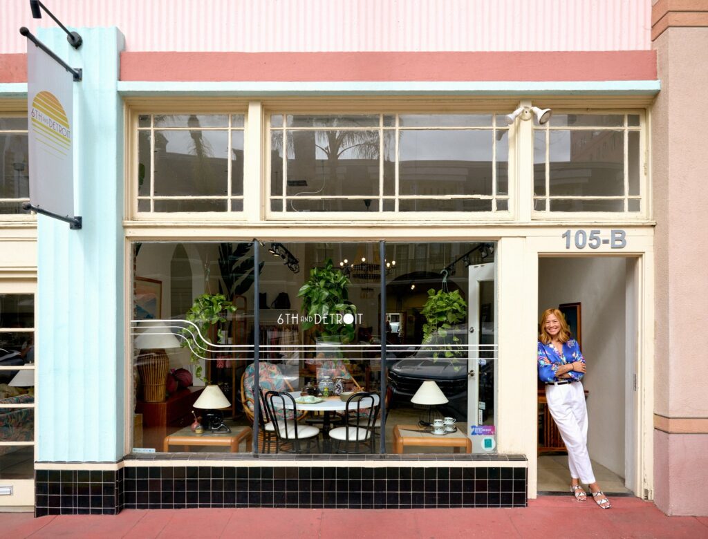 Michelle Qazi, owner of 6th and Detroit, standing in front of her DTLB storefront. Courtesy of Qazi.