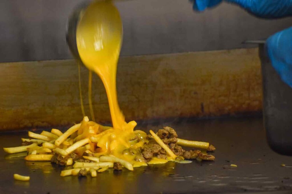 Cheese up them fries: Adalberto's was one of the first procurers of asada fries, nacho fries, and more. Photo by Brian Addison.