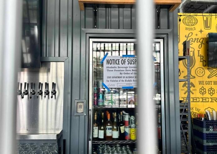 A notice was put up immediately on Jan. 5 letting patrons know Bottlecraft's license has been suspended. Photo by Erin Poe.